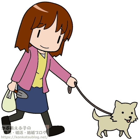 犬の散歩をする女性